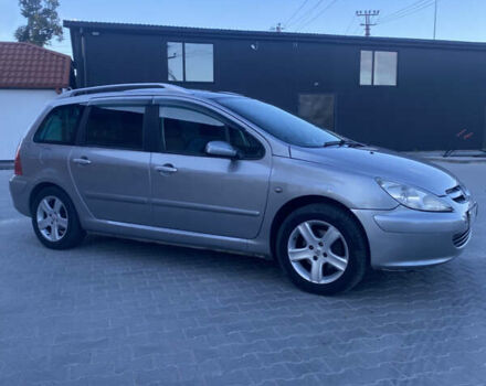 Серый Пежо 307, объемом двигателя 2 л и пробегом 263 тыс. км за 3750 $, фото 3 на Automoto.ua