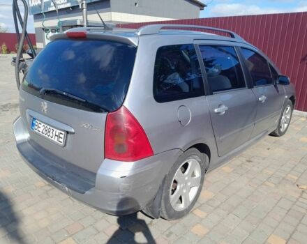 Серый Пежо 307, объемом двигателя 2 л и пробегом 10 тыс. км за 2800 $, фото 6 на Automoto.ua
