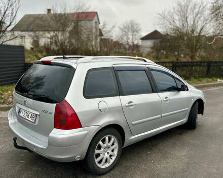 Серый Пежо 307, объемом двигателя 2 л и пробегом 249 тыс. км за 4450 $, фото 6 на Automoto.ua