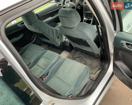 Сірий Пежо 307, об'ємом двигуна 1.59 л та пробігом 300 тис. км за 2000 $, фото 25 на Automoto.ua