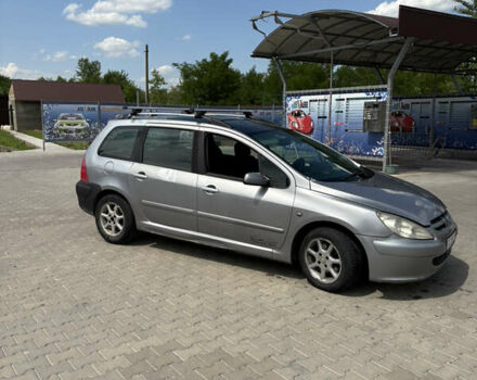 Серый Пежо 307, объемом двигателя 2 л и пробегом 395 тыс. км за 2700 $, фото 2 на Automoto.ua
