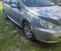 Сірий Пежо 307, об'ємом двигуна 1.6 л та пробігом 250 тис. км за 2699 $, фото 1 на Automoto.ua