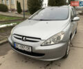 Сірий Пежо 307, об'ємом двигуна 1.59 л та пробігом 300 тис. км за 2000 $, фото 17 на Automoto.ua