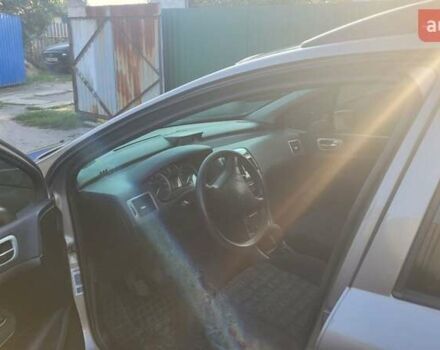 Сірий Пежо 307, об'ємом двигуна 1.59 л та пробігом 359 тис. км за 2850 $, фото 2 на Automoto.ua