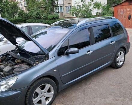 Серый Пежо 307, объемом двигателя 2 л и пробегом 360 тыс. км за 3600 $, фото 1 на Automoto.ua