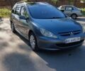 Серый Пежо 307, объемом двигателя 1.6 л и пробегом 390 тыс. км за 3900 $, фото 1 на Automoto.ua