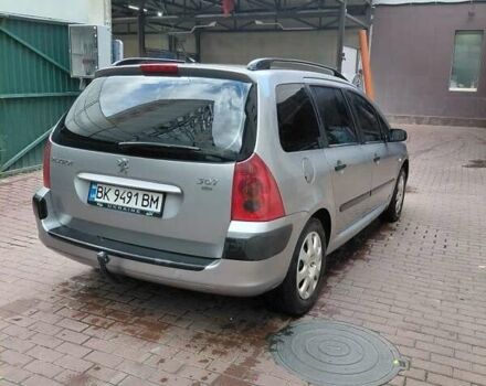 Серый Пежо 307, объемом двигателя 1.4 л и пробегом 400 тыс. км за 3500 $, фото 5 на Automoto.ua
