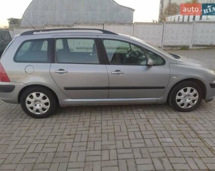 Сірий Пежо 307, об'ємом двигуна 1.59 л та пробігом 290 тис. км за 4200 $, фото 1 на Automoto.ua