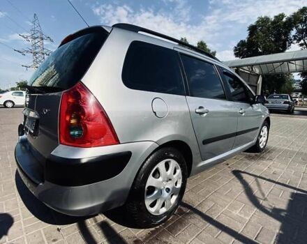 Сірий Пежо 307, об'ємом двигуна 1.36 л та пробігом 235 тис. км за 3800 $, фото 14 на Automoto.ua