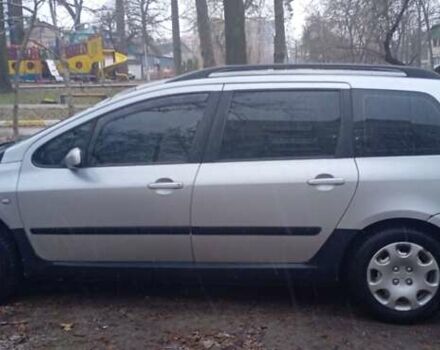 Серый Пежо 307, объемом двигателя 1.4 л и пробегом 333 тыс. км за 3100 $, фото 3 на Automoto.ua