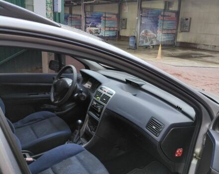 Серый Пежо 307, объемом двигателя 1.4 л и пробегом 400 тыс. км за 3500 $, фото 7 на Automoto.ua