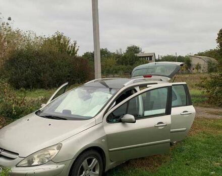 Сірий Пежо 307, об'ємом двигуна 1.6 л та пробігом 296 тис. км за 2600 $, фото 3 на Automoto.ua