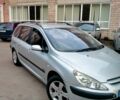 Серый Пежо 307, объемом двигателя 2 л и пробегом 267 тыс. км за 4599 $, фото 1 на Automoto.ua