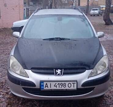 Серый Пежо 307, объемом двигателя 1.4 л и пробегом 333 тыс. км за 3100 $, фото 4 на Automoto.ua