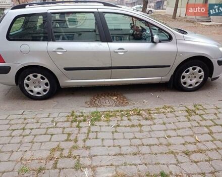 Серый Пежо 307, объемом двигателя 1.4 л и пробегом 171 тыс. км за 3400 $, фото 9 на Automoto.ua