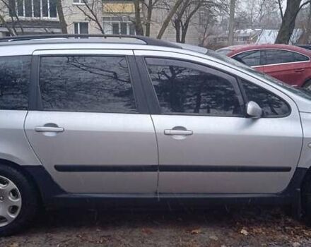 Серый Пежо 307, объемом двигателя 1.4 л и пробегом 333 тыс. км за 3100 $, фото 7 на Automoto.ua