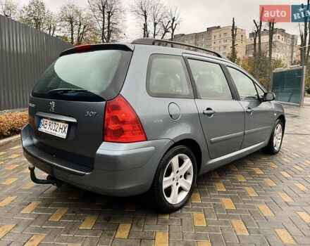 Серый Пежо 307, объемом двигателя 1.36 л и пробегом 320 тыс. км за 4100 $, фото 10 на Automoto.ua