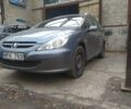 Серый Пежо 307, объемом двигателя 1.6 л и пробегом 302 тыс. км за 1600 $, фото 1 на Automoto.ua
