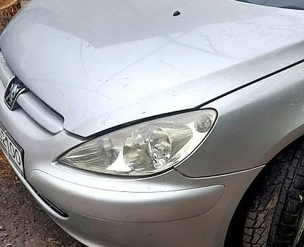 Серый Пежо 307, объемом двигателя 1.6 л и пробегом 205 тыс. км за 2100 $, фото 4 на Automoto.ua
