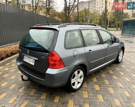 Серый Пежо 307, объемом двигателя 1.36 л и пробегом 320 тыс. км за 4100 $, фото 7 на Automoto.ua