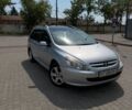Серый Пежо 307, объемом двигателя 2 л и пробегом 190 тыс. км за 4200 $, фото 1 на Automoto.ua