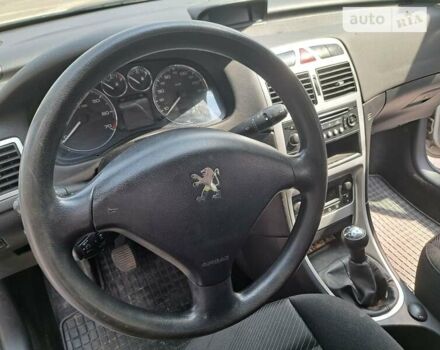 Серый Пежо 307, объемом двигателя 2 л и пробегом 320 тыс. км за 4400 $, фото 18 на Automoto.ua