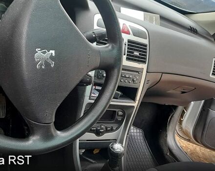 Серый Пежо 307, объемом двигателя 1.6 л и пробегом 205 тыс. км за 2100 $, фото 5 на Automoto.ua