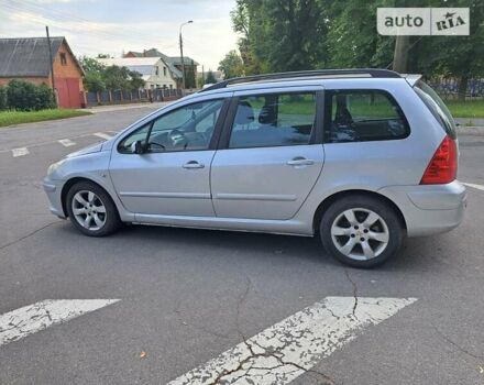 Серый Пежо 307, объемом двигателя 2 л и пробегом 320 тыс. км за 4400 $, фото 4 на Automoto.ua