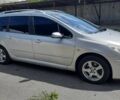 Серый Пежо 307, объемом двигателя 1.6 л и пробегом 245 тыс. км за 4300 $, фото 1 на Automoto.ua