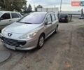 Серый Пежо 307, объемом двигателя 1.59 л и пробегом 200 тыс. км за 3900 $, фото 1 на Automoto.ua
