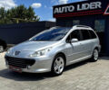 Серый Пежо 307, объемом двигателя 2 л и пробегом 219 тыс. км за 5600 $, фото 8 на Automoto.ua