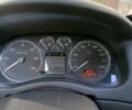 Сірий Пежо 307, об'ємом двигуна 2.01 л та пробігом 229 тис. км за 4900 $, фото 3 на Automoto.ua