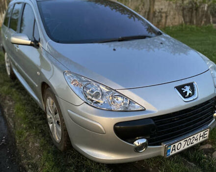 Сірий Пежо 307, об'ємом двигуна 2 л та пробігом 234 тис. км за 4800 $, фото 1 на Automoto.ua