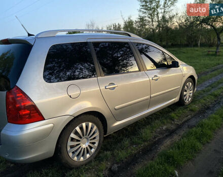 Сірий Пежо 307, об'ємом двигуна 2 л та пробігом 234 тис. км за 4800 $, фото 7 на Automoto.ua