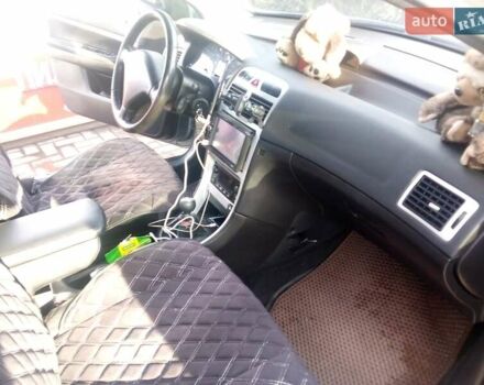 Сірий Пежо 307, об'ємом двигуна 1.59 л та пробігом 262 тис. км за 4000 $, фото 6 на Automoto.ua