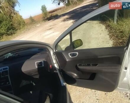 Серый Пежо 307, объемом двигателя 1.6 л и пробегом 253 тыс. км за 4250 $, фото 9 на Automoto.ua