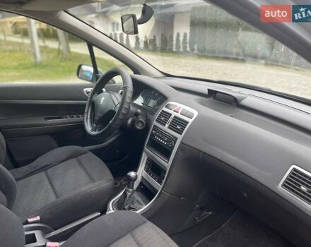 Серый Пежо 307, объемом двигателя 2 л и пробегом 171 тыс. км за 4400 $, фото 2 на Automoto.ua
