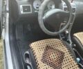 Сірий Пежо 307, об'ємом двигуна 1.59 л та пробігом 184 тис. км за 4600 $, фото 3 на Automoto.ua