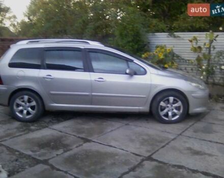 Серый Пежо 307, объемом двигателя 2 л и пробегом 237 тыс. км за 6000 $, фото 1 на Automoto.ua