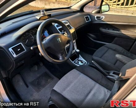 Серый Пежо 307, объемом двигателя 2 л и пробегом 387 тыс. км за 3500 $, фото 3 на Automoto.ua