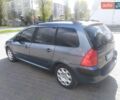 Серый Пежо 307, объемом двигателя 1.36 л и пробегом 265 тыс. км за 3000 $, фото 1 на Automoto.ua
