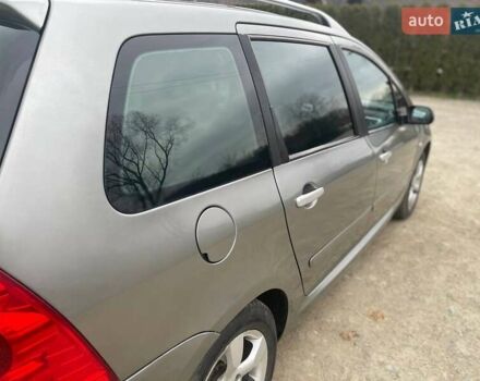 Серый Пежо 307, объемом двигателя 2 л и пробегом 171 тыс. км за 4400 $, фото 1 на Automoto.ua