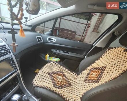 Сірий Пежо 307, об'ємом двигуна 1.59 л та пробігом 184 тис. км за 4600 $, фото 4 на Automoto.ua