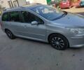 Сірий Пежо 307, об'ємом двигуна 1.59 л та пробігом 245 тис. км за 5300 $, фото 1 на Automoto.ua