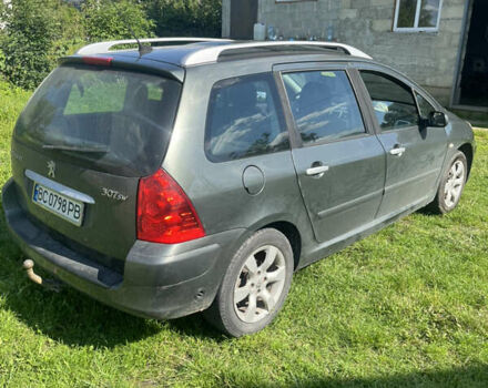 Серый Пежо 307, объемом двигателя 2 л и пробегом 283 тыс. км за 4100 $, фото 4 на Automoto.ua