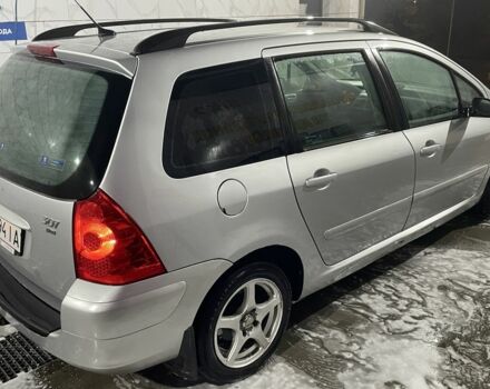 Серый Пежо 307, объемом двигателя 1.6 л и пробегом 306 тыс. км за 2849 $, фото 2 на Automoto.ua