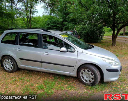 Серый Пежо 307, объемом двигателя 1.6 л и пробегом 286 тыс. км за 4500 $, фото 5 на Automoto.ua