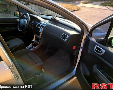 Серый Пежо 307, объемом двигателя 2 л и пробегом 387 тыс. км за 3500 $, фото 4 на Automoto.ua