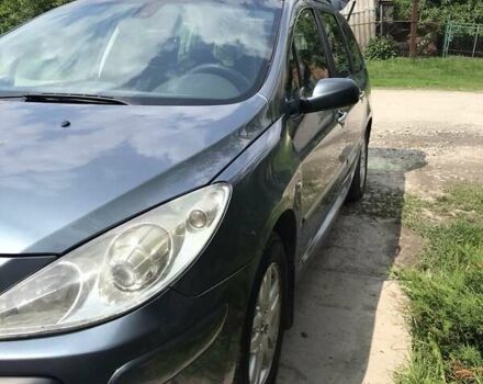 Серый Пежо 307, объемом двигателя 1.6 л и пробегом 297 тыс. км за 5700 $, фото 3 на Automoto.ua