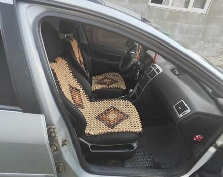 Сірий Пежо 307, об'ємом двигуна 1.59 л та пробігом 184 тис. км за 4600 $, фото 11 на Automoto.ua